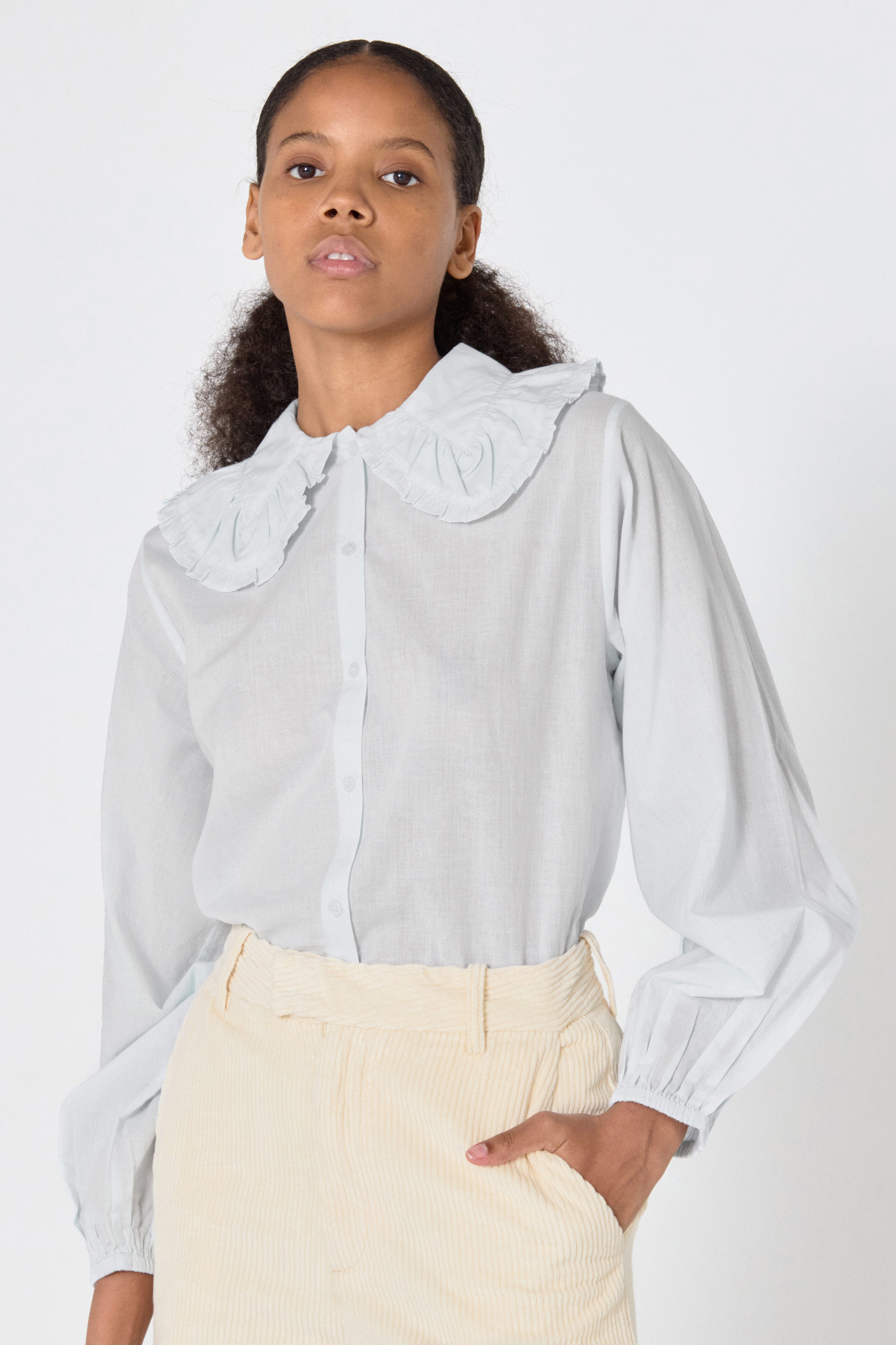 Frill neck blouse pastel blue