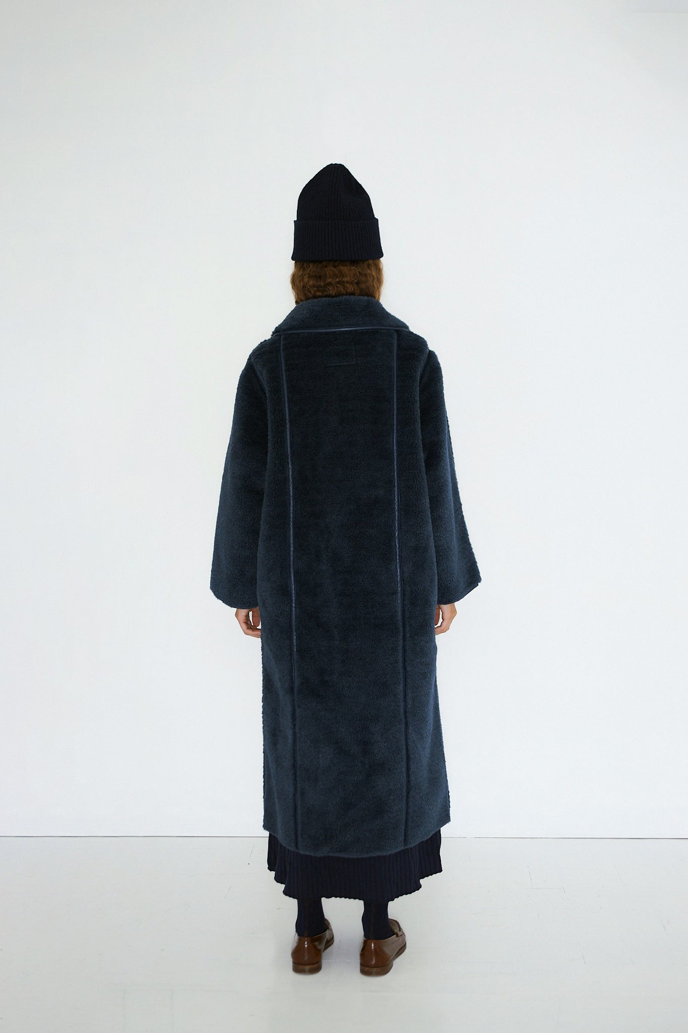 REVERSIBLE FAUX FUR LONG COAT navy | THE TINY BIG SISTER