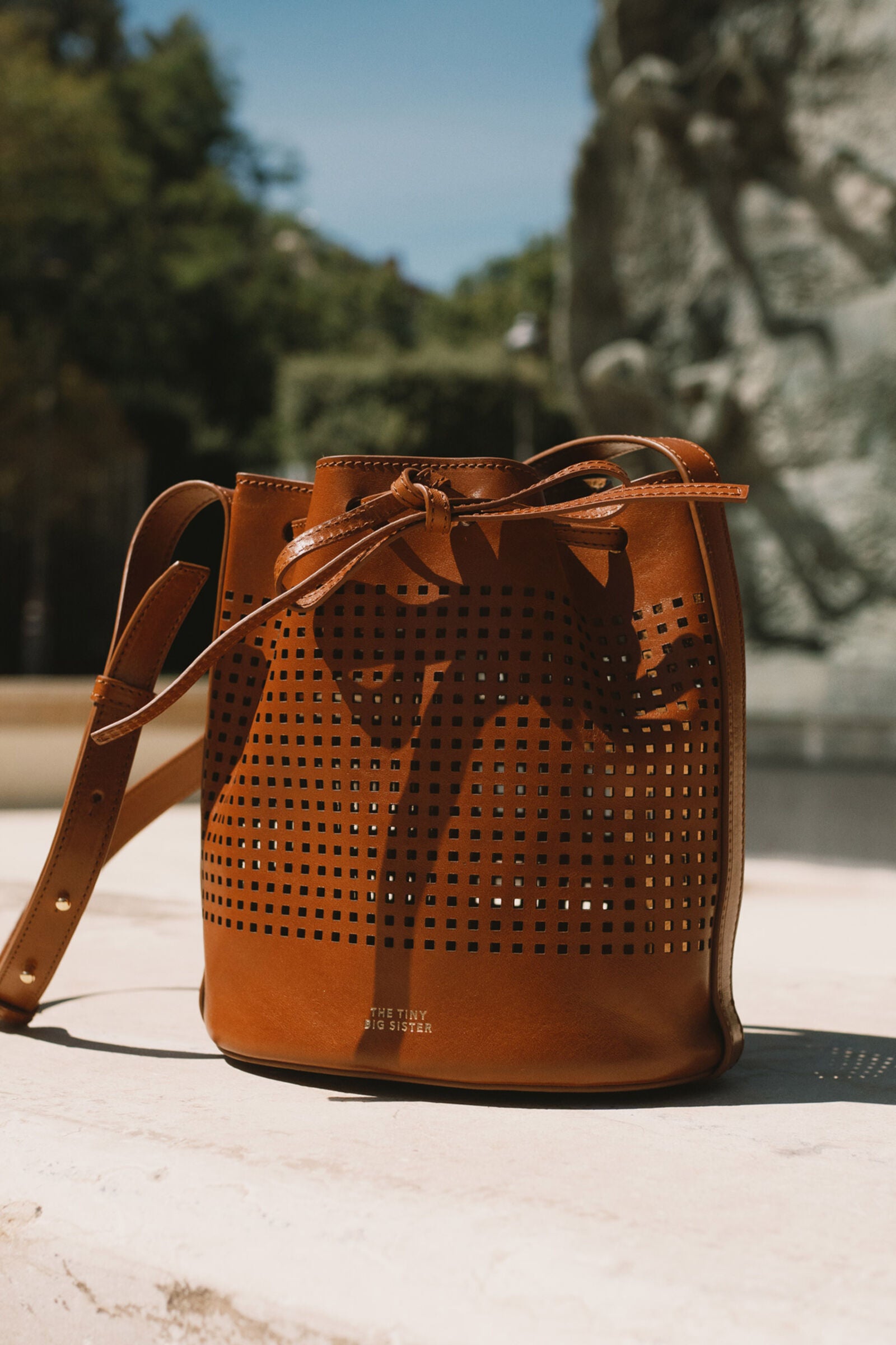 ANNE PERFORATED LEATHER SMALL BUCKET BAG light brown